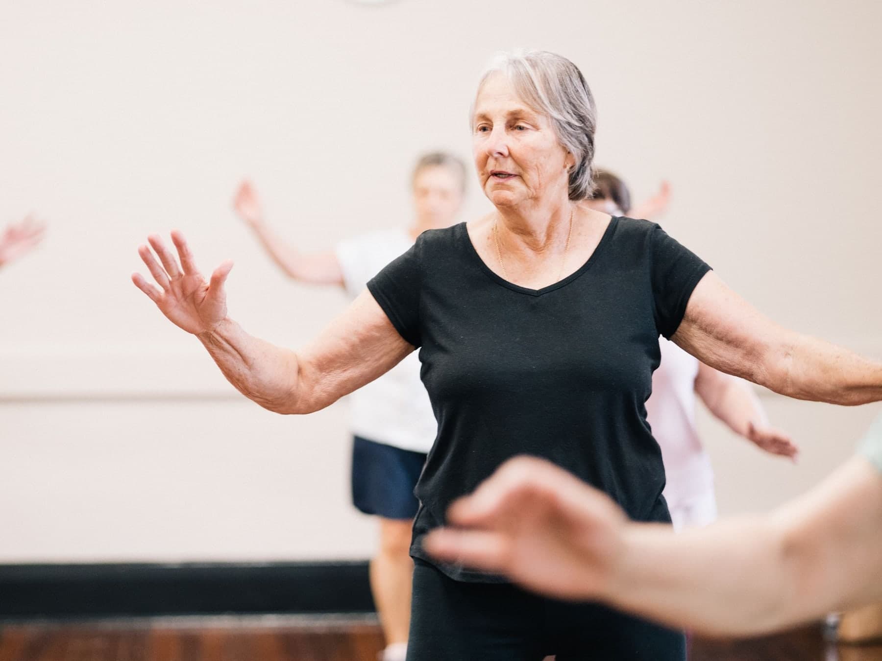 Older adults enjoying a dance class