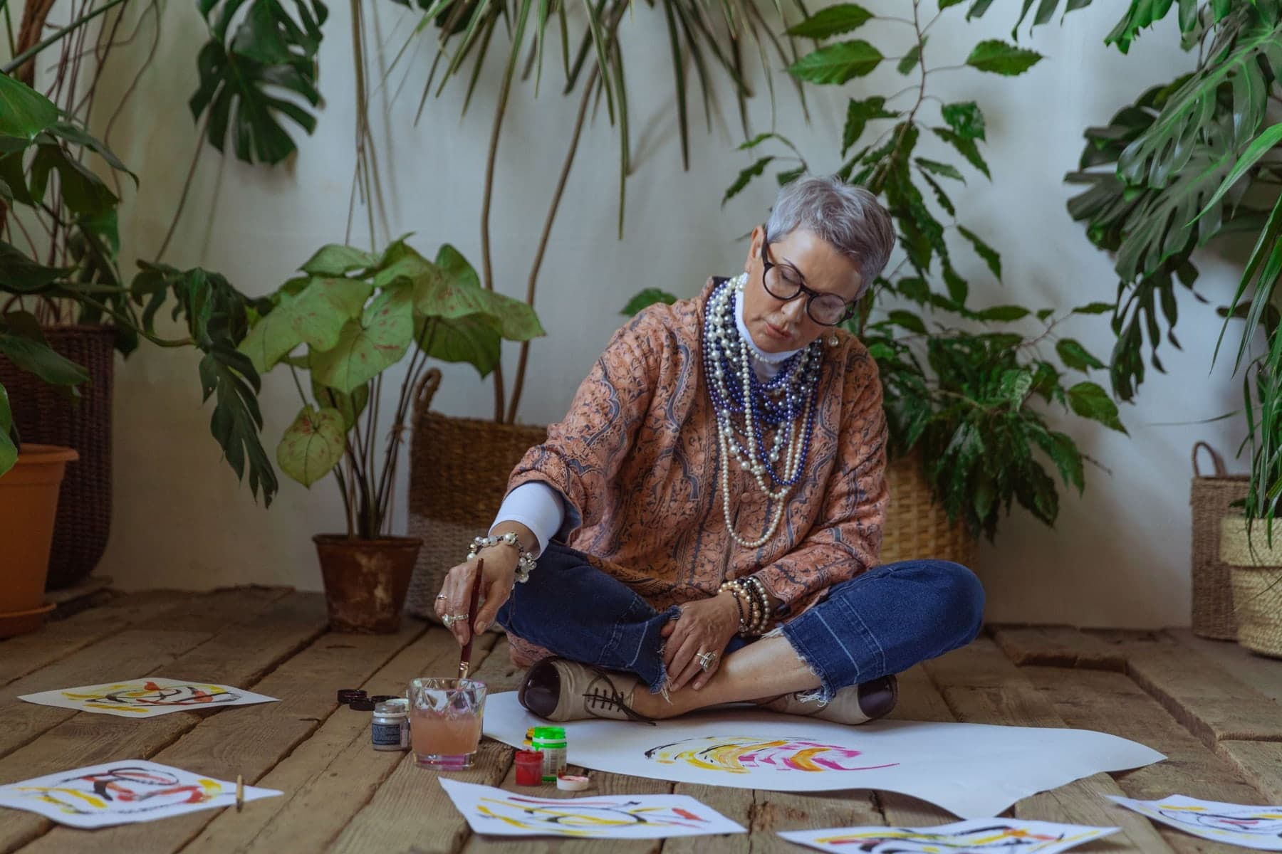Older woman concentrating on a new creative skill