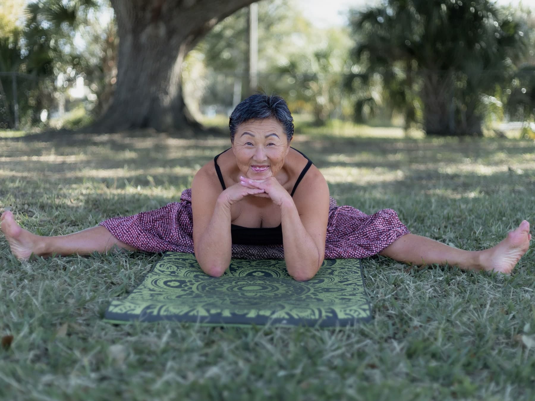 Older adult stretching after an outdoor exercise session