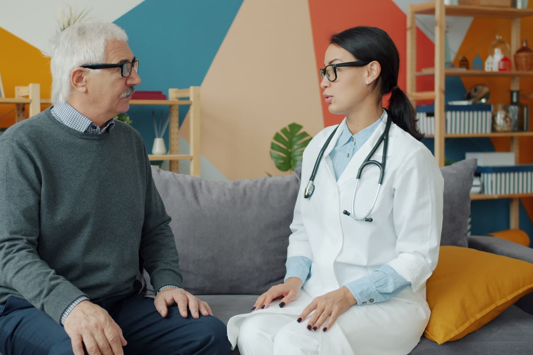 Older woman speaking with a healthcare professional